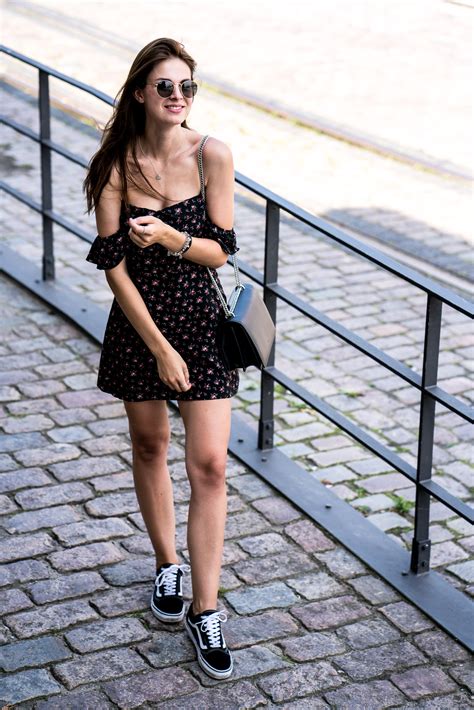 black dress with sneakers outfit.